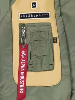 ALPHA X UNDERCOVER THE SHEPHERD MA-1 BOMBER JACKET