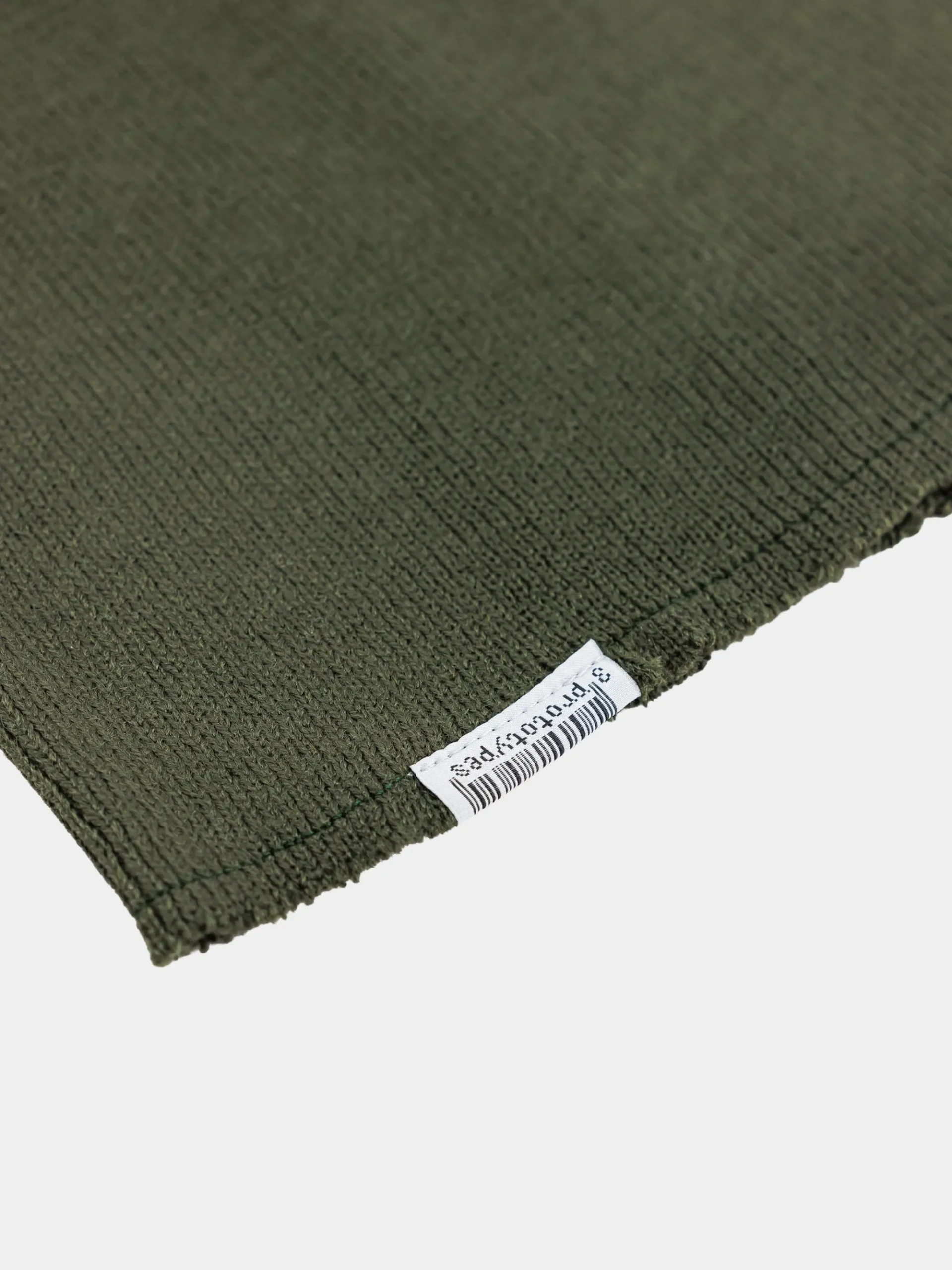 PROTOTYPES X ALPHA RAW BEANIE LABEL